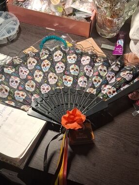 Source Unknown Black Sugar Skull Folding Fan with Orange Flower